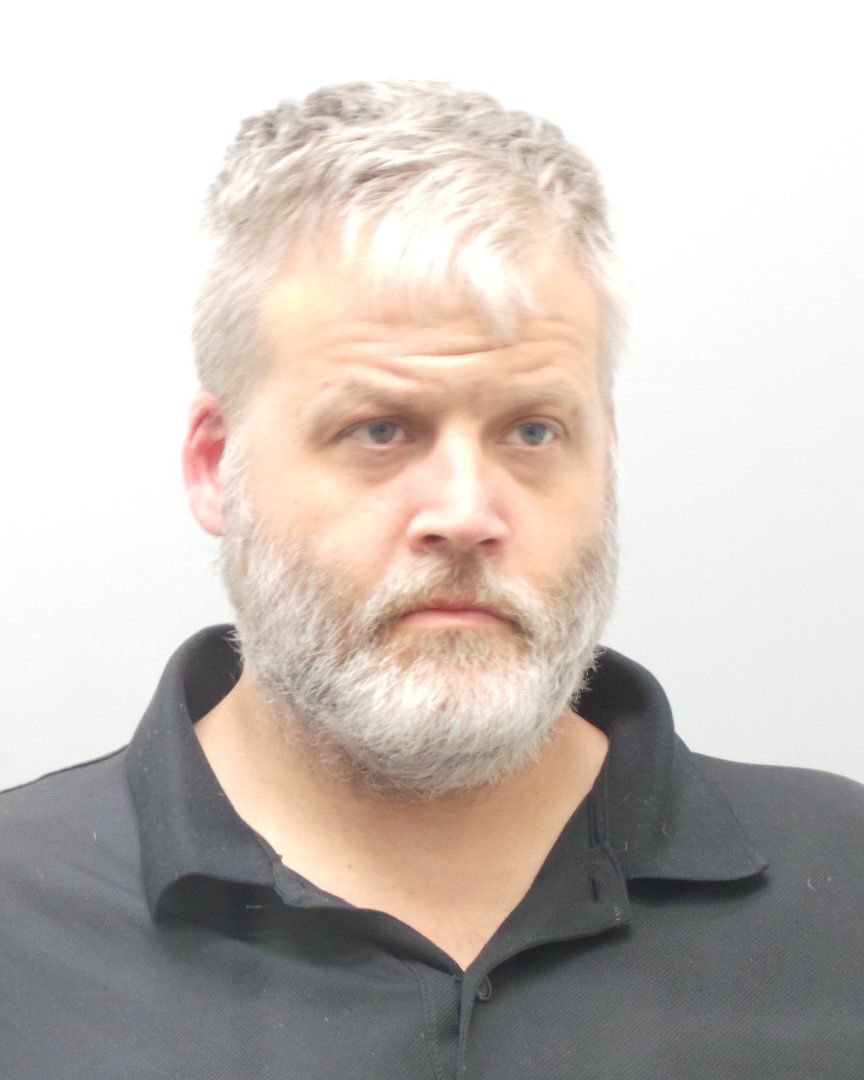 Button-down bandit caught after robbing south St. Louis County bank